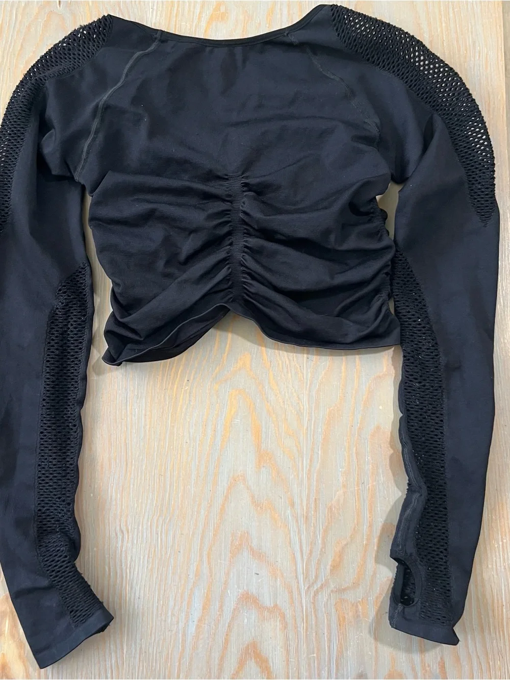 Free People Movement on the rise long sleeve ruched top mesh sleeves black